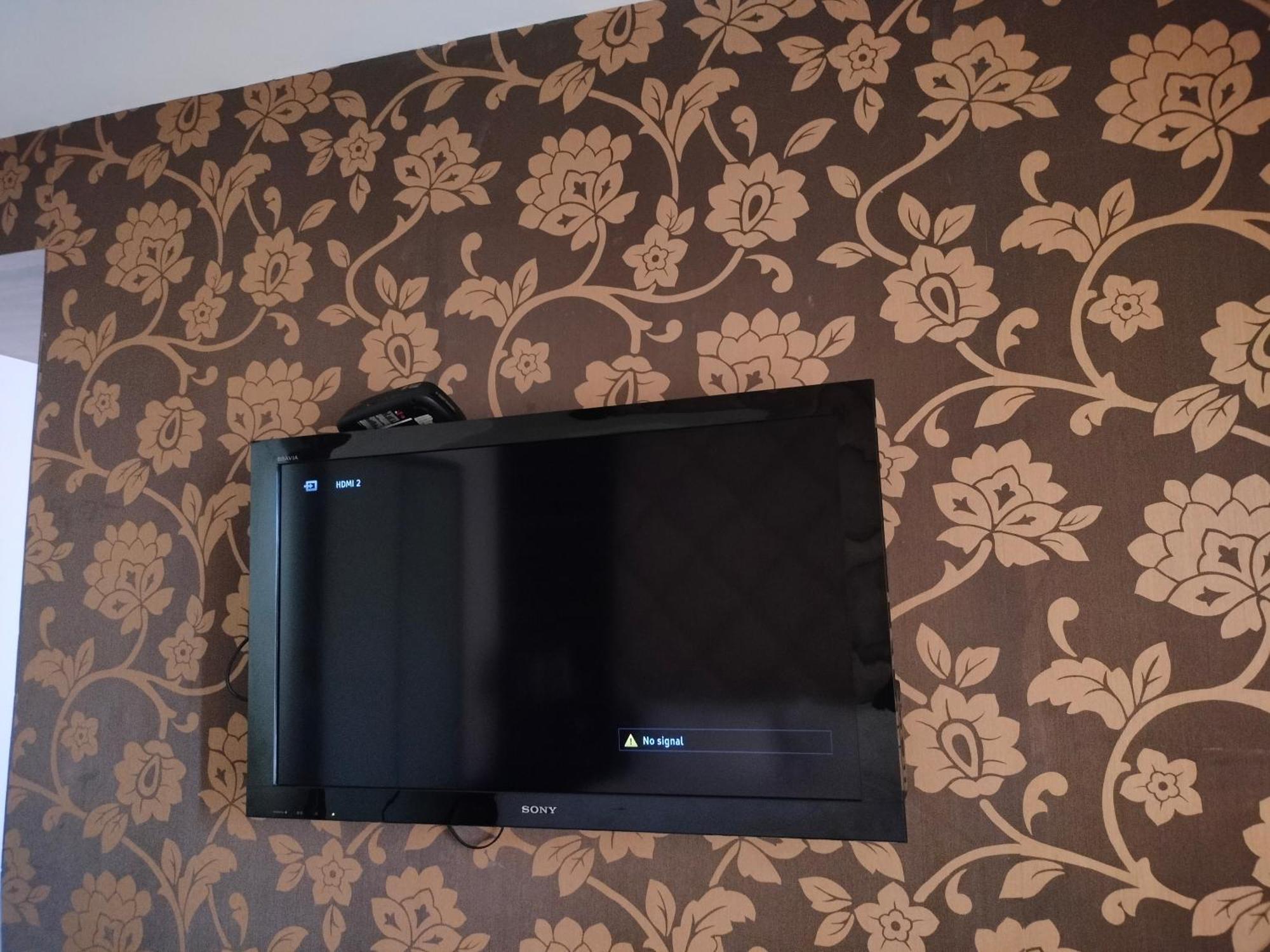 Holiday Inn Chandigarh Panchkula, An Ihg Hotel Eksteriør bilde A television mounted on a wall